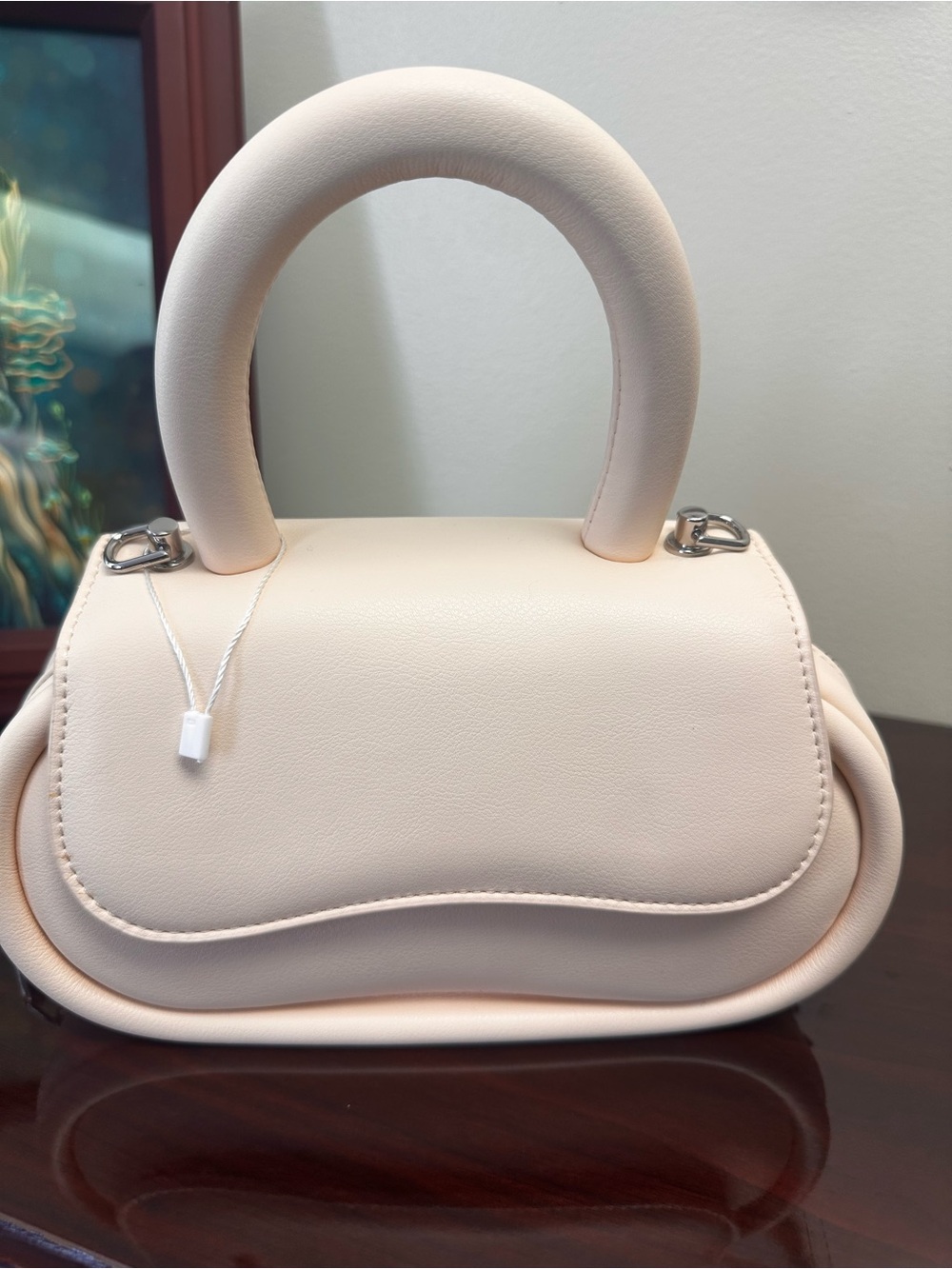 Melie Bianco Cream Sculpted Top-Handle Crossbody